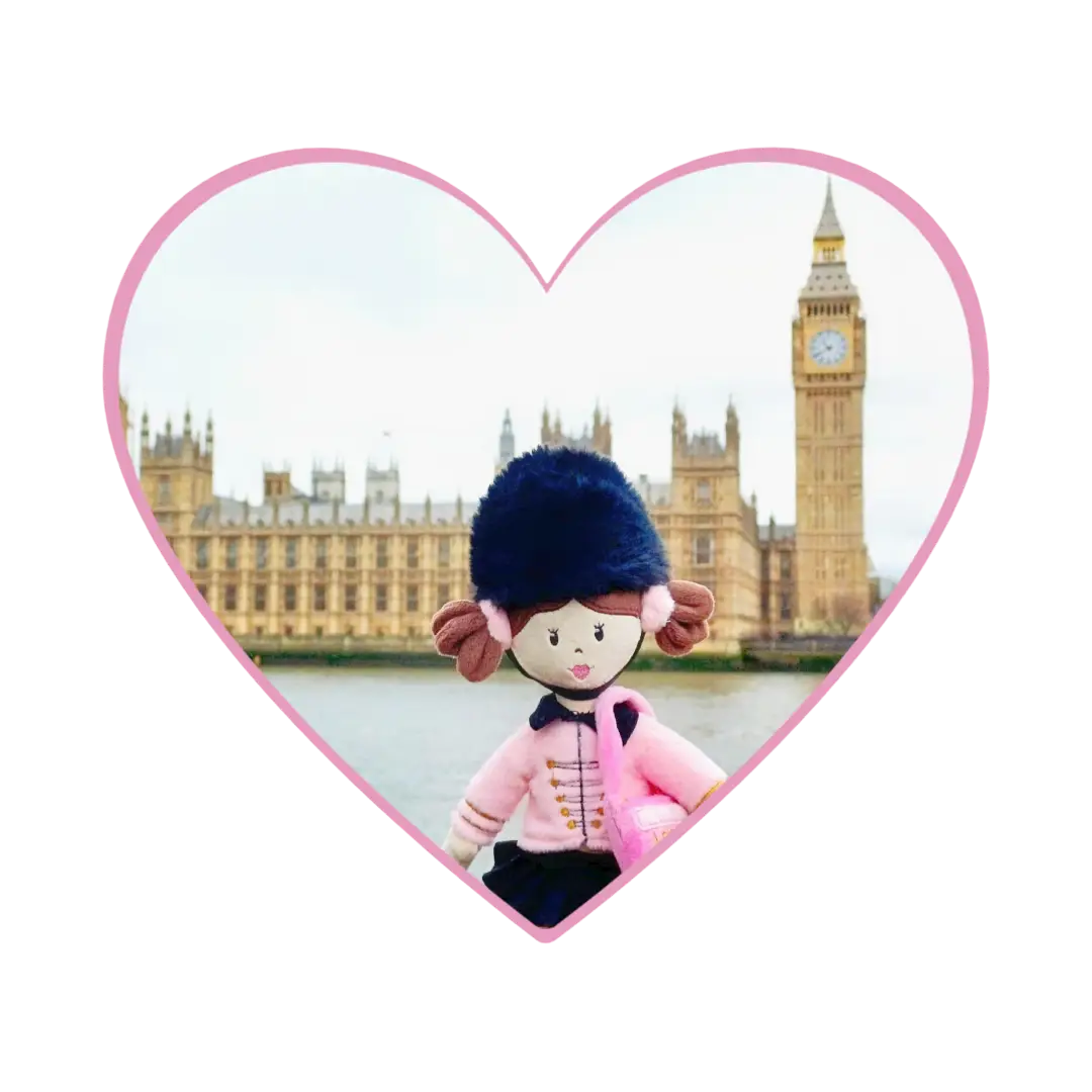 Arabella bear doll standing next to Big Ben